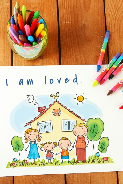 affirmations for children on table with crayons